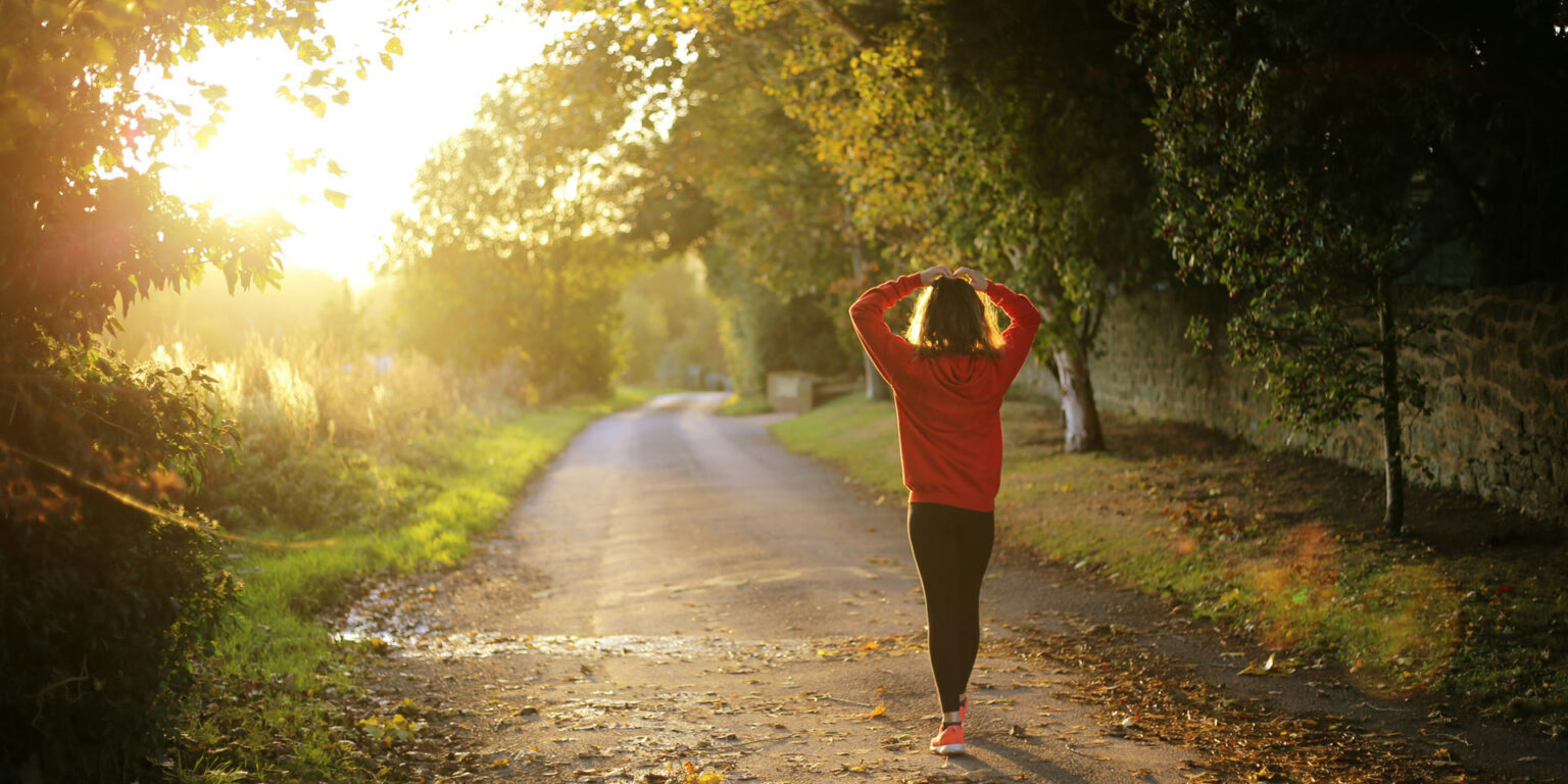 woman walking in forrest